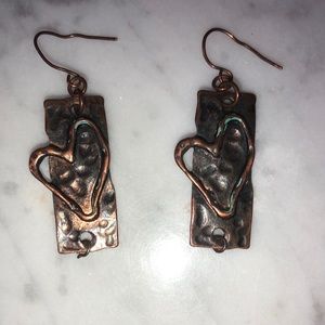 Earrings with a heart.